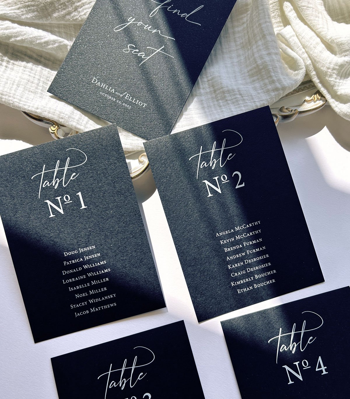 Navy blue metallic wedding seating chart printed in white by LCI Paper Co.